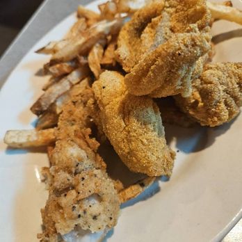 Catfish Hole signature dishes All-You-Can-Eat Fried Catfish, Hushpuppies, Fried Shrimp